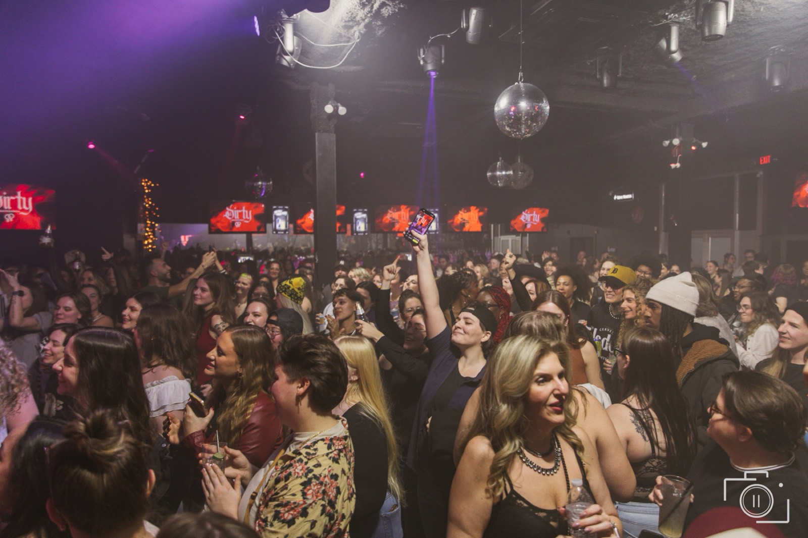 A venue at capacity mid-event — full floor and crowd energy. Event coverage by Brian Mullin, Pause Studios.