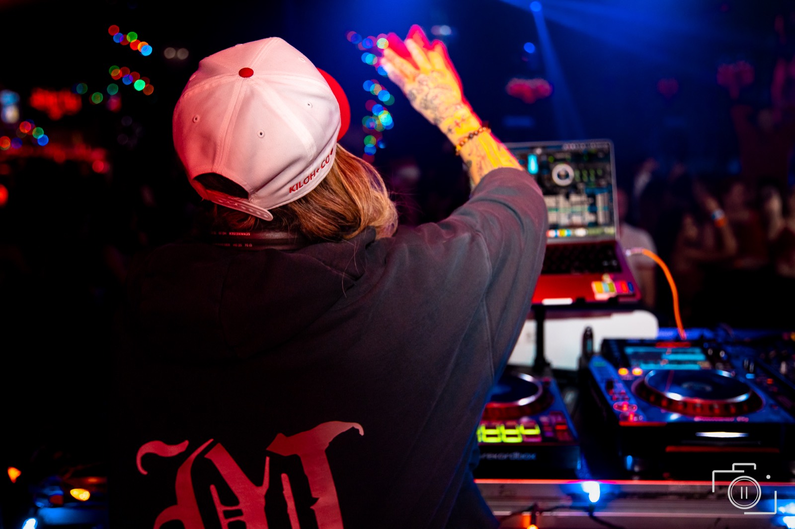 Overhead view of a packed dancefloor and crowd energy at a live event. Event coverage by Brian Mullin, Pause Studios.