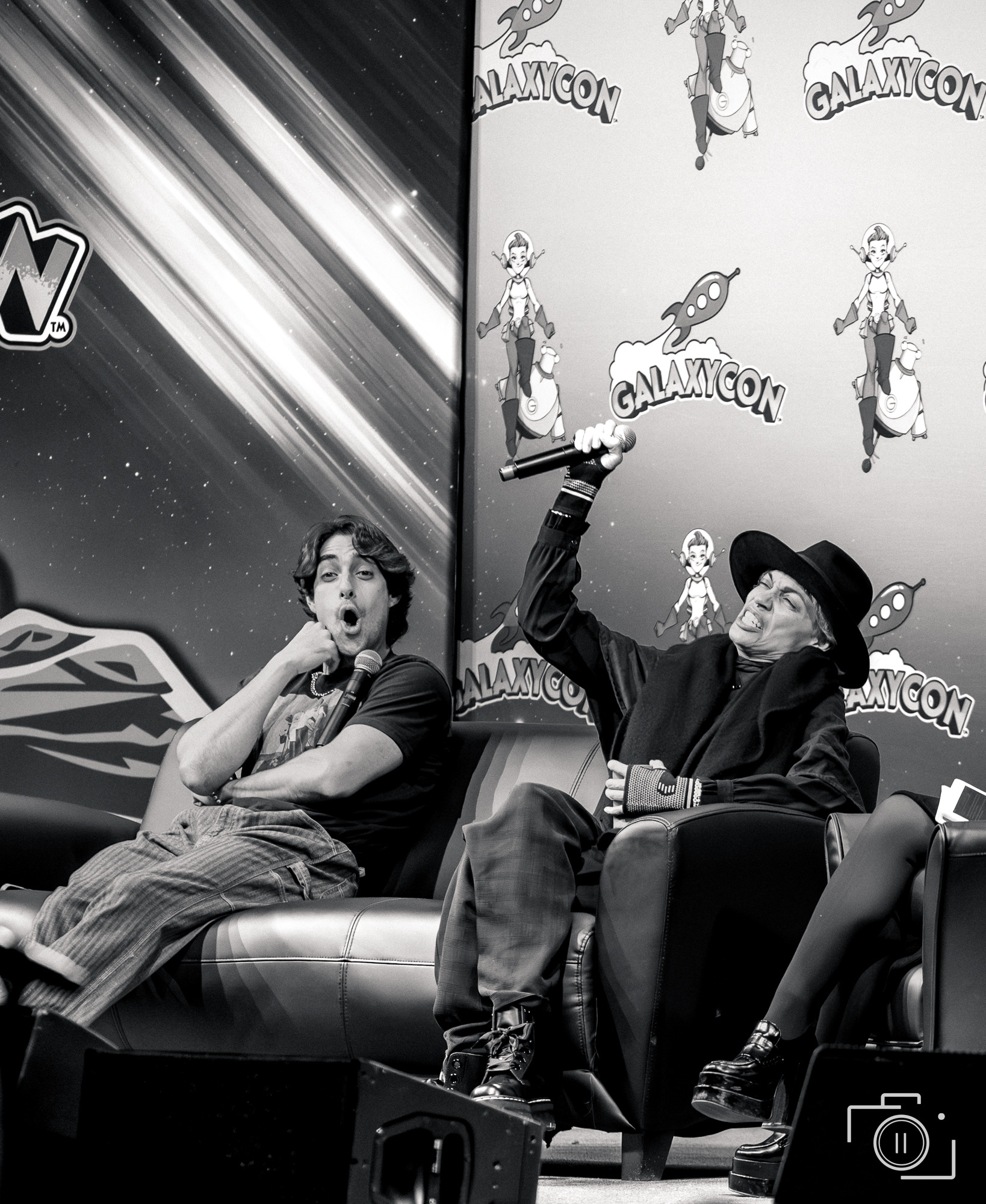 Candid energy moment at GalaxyCon Columbus 2025, black and white. Editorial convention photography by Brian Mullin, Pause Studios.