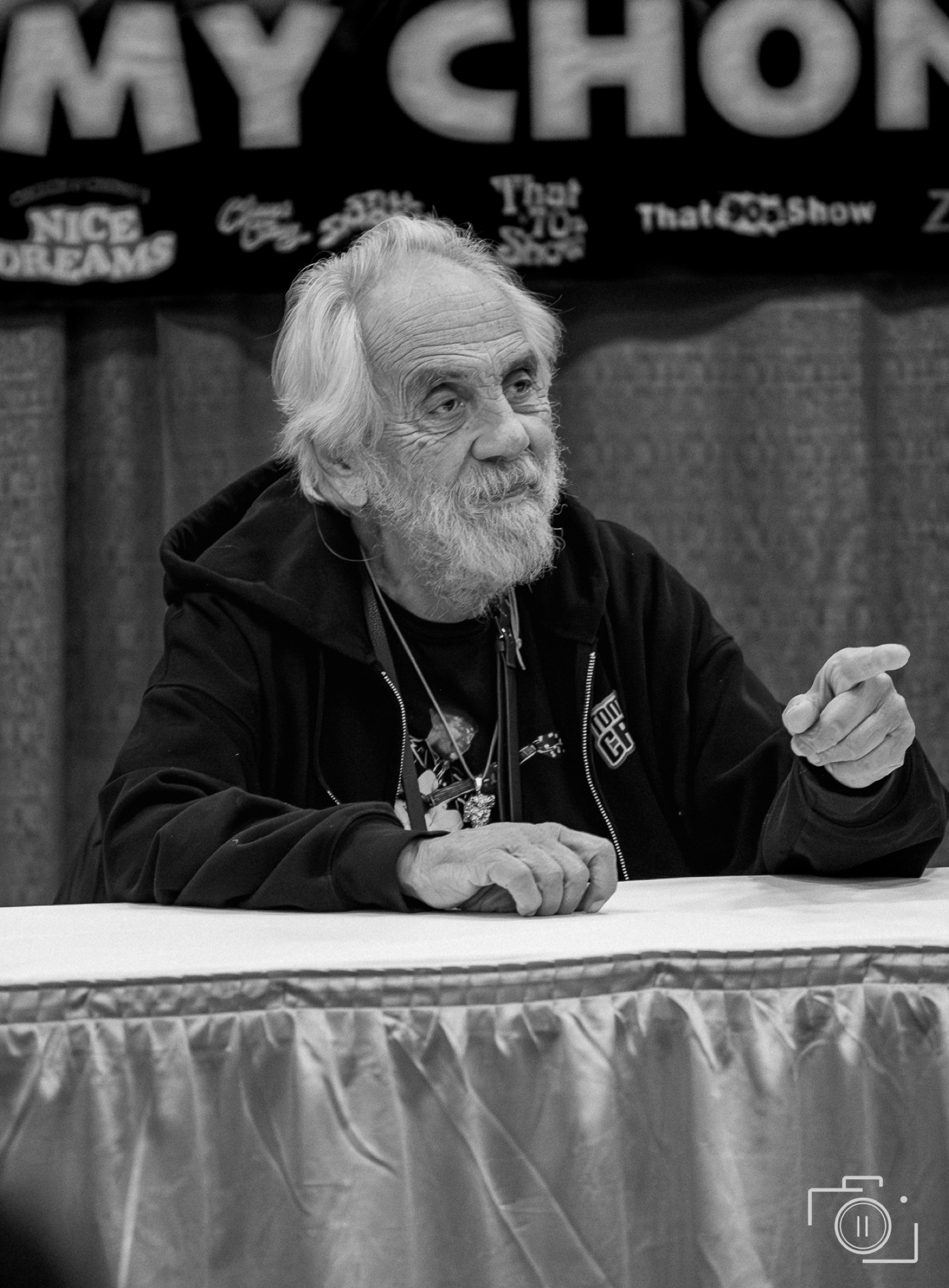 Tommy Chong at Galaxy Con Columbus 2025 — black and white portrait with credits banner visible. Editorial photography by Brian Mullin, Pause Studios.