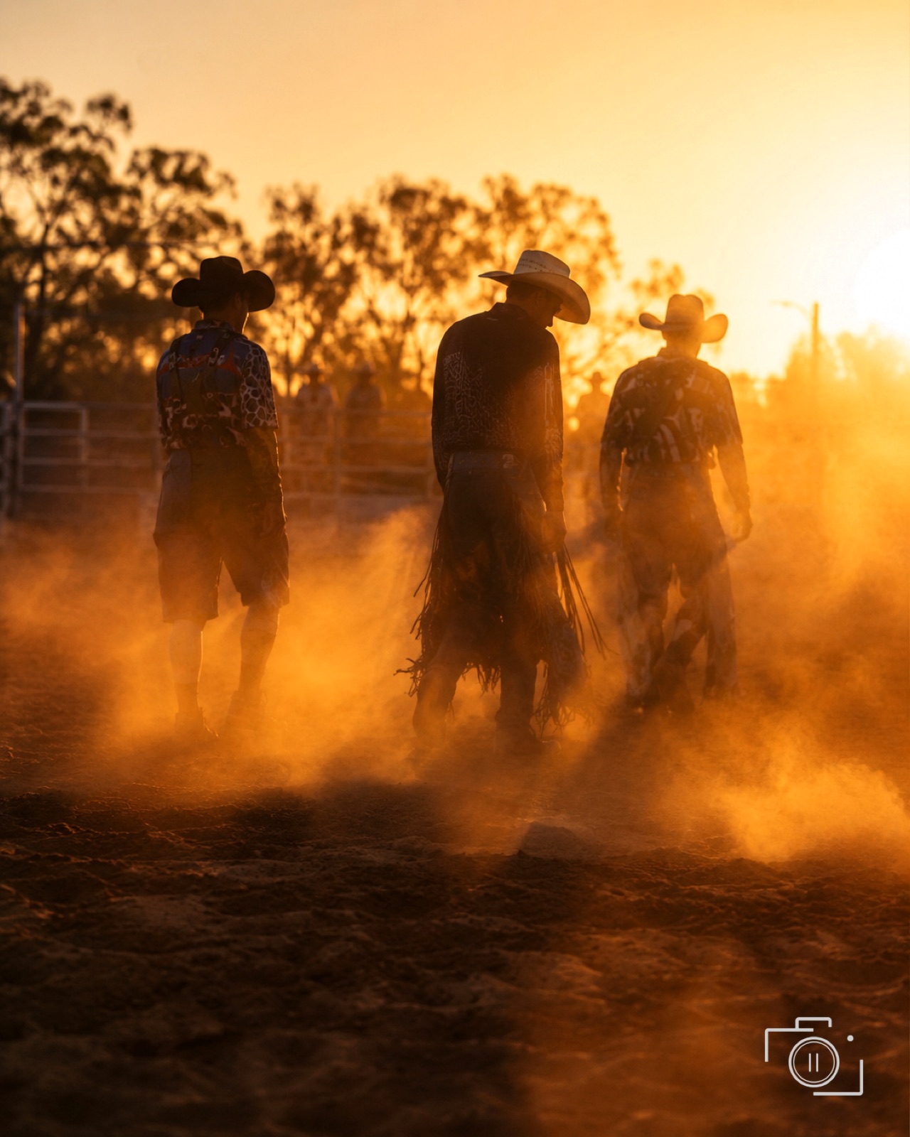 Horse and rider in golden arena light — western and equine event coverage by Brian Mullin, Pause Studios.
